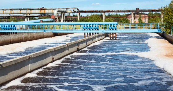 Industrial wastewater treatment basins with aeration